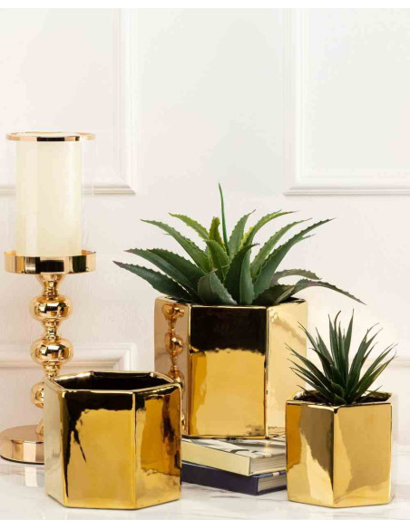 Doniczka Mia Gold 12 cm Wykonana z ceramiki w kolorze złotym. Wymiary: 14x12x12 cm.